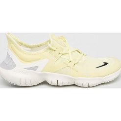 Nike - Buty Free RN 5.0. Żółte buty sportowe damskie Nike, bez wzorów, z materiału, sportowe. W wyprzedaży za 399,90 zł.