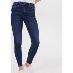 Jeansy skinny z wysokim stanem - Niebieski. Niebieskie jeansy damskie Mohito, z podwyższonym stanem. Za 119,99 zł.