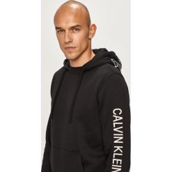 Calvin Klein Jeans - Bluza. Czarne bluzy męskie s, z aplikacjami, z bawełny, z kapturem. W wyprzedaży za 319,90 zł.