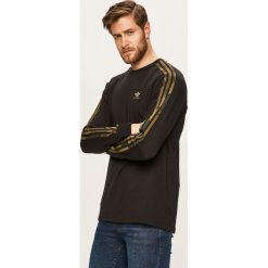Adidas Originals - Bluza. Czarne bluzy męskie m, z aplikacjami, z elastanu, z okrągłym kołnierzem. Za 149,90 zł.