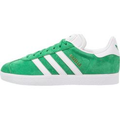 Adidas Originals GAZELLE Tenisówki i Trampki green/white/gold metallic. Zielone tenisówki męskie marki adidas Originals, z materiału. Za 399,00 zł.