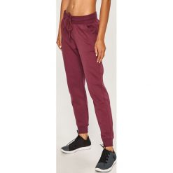 Under Armour - Spodnie. Szare spodnie damskie Under Armour, s, bez wzorów, z bawełny. Za 179,90 zł.