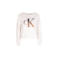 Bluzy Calvin Klein Jeans J20J206975 / Hebe True Icon. Brązowe bluzy damskie Calvin Klein Jeans, bez wzorów, z jeansu, bez rękawów, bez kaptura. Za 299,00 zł.