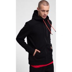 Bluza męska BLM220 - głęboka czerń. Bluzy męskie 4f, s, bez wzorów, z bawełny, z kapturem, bez rękawów, z kapturem. W wyprzedaży za 119,99 zł.