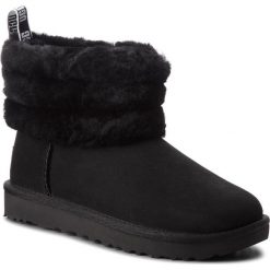 Buty UGG - W Fluff Mini 1098533 W/Blk. Czarne kozaki damskie Ugg, ze skóry, na niskim obcasie, bez zapięcia. Za 919,00 zł.