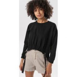 Czarna Bluza Morgalyn. Czarne bluzy damskie Born2be, xl, bez wzorów, bez rękawów, bez kaptura. W wyprzedaży za 69,99 zł.