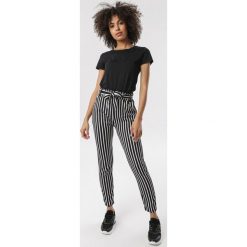 Czarne Spodnie Oaralin. Czarne jeansy damskie Born2be, xl, z podwyższonym stanem. Za 59,99 zł.