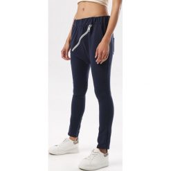 Granatowe Spodnie Adrealin. Niebieskie spodnie damskie Born2be, xl, z dresówki. W wyprzedaży za 69,99 zł.
