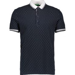 Koszulka polo w kolorze granatowym. Niebieskie koszulki męskie Benetton, s, bez wzorów, z bawełny, polo, bez rękawów. W wyprzedaży za 55,95 zł.