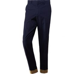 Chinosy męskie: The Editor Spodnie materiałowe dark blue