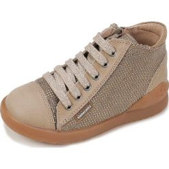 Skórzane sneakersy w kolorze beżowym. Brązowe trampki dziewczęce Biomecanics, bez wzorów, na sznurówki. W wyprzedaży za 192,95 zł.