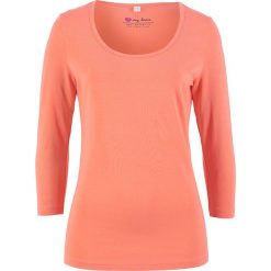 Shirt z rękawami 3/4 bonprix łososiowy. Pomarańczowe koszulki damskie marki bonprix, z nadrukiem, z okrągłym kołnierzem, bez rękawów. Za 34,99 zł.