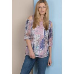 Bluzka w stylu hippie. Bluzki damskie Monnari, bez wzorów, z falbankami. Za 79,50 zł.