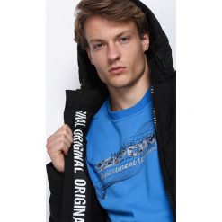 Czarna Kurtka All Things Go. Czarne kurtki męskie pikowane marki TRIBAN, na zimę, xl, z elastanu. Za 179,99 zł.