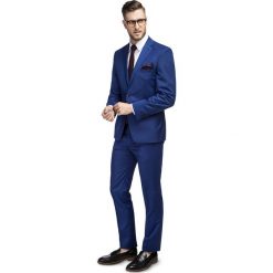 Garnitur CRISTIANO 1 E16-18P. Niebieskie garnitury męskie Giacomo Conti, bez wzorów, z wełny. Za 699,00 zł.