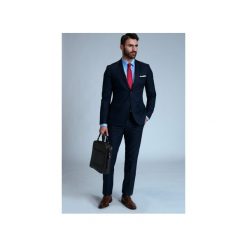 GARNITUR NAVY. Niebieskie garnitury męskie marki Guns&tuxedos, bez wzorów. Za 699,99 zł.