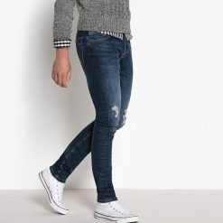Jeansy krój skinny styl destroy. Niebieskie jeansy męskie skinny marki La Redoute Collections. Za 141,08 zł.