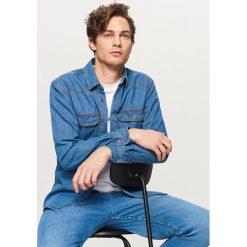 Jeansowa koszula regular fit - Niebieski. Niebieskie koszule męskie Reserved, xl, bez wzorów, z jeansu, bez kołnierzyka, bez rękawów. Za 79,99 zł.