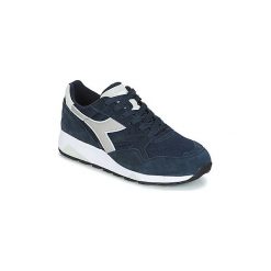 Buty Diadora N902 S. Niebieskie trampki męskie Diadora, bez wzorów, bez zapięcia. Za 351,20 zł.