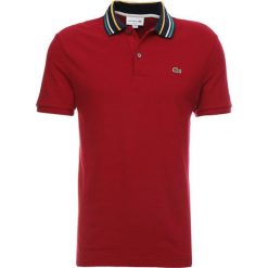 Lacoste Koszulka polo bordeaux. Czerwone koszulki męskie Lacoste, xl, bez wzorów, z bawełny, polo, bez rękawów. Za 419,00 zł.