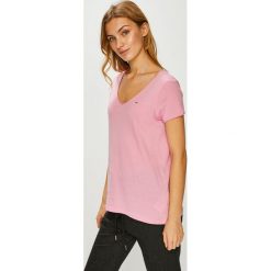 Tommy Jeans - Top. Różowe topy damskie marki Tommy Jeans, s, z bawełny. Za 119,90 zł.