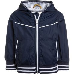 Timberland BABY LAYETTE KAPUZENBLOUSON Kurtka przejściowa marine. Niebieskie kurtki chłopięce przejściowe marki Timberland, z materiału, marine. Za 289,00 zł.