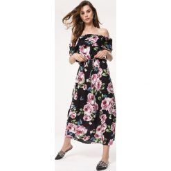 Czarna Sukienka Rambler. Czarne sukienki damskie Born2be, na plażę, s, bez wzorów, bez kołnierzyka, bez rękawów, maxi. Za 59,99 zł.