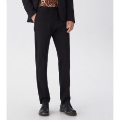 Spodnie garniturowe slim fit - Czarny. Czarne spodnie garniturowe męskie House, s, bez wzorów. Za 149,99 zł.