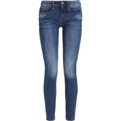 GStar 3301 DECONST MID SKINNY Jeans Skinny Fit yzzi stretch. Niebieskie jeansy damskie G-Star, z elastanu. W wyprzedaży za 475,15 zł.