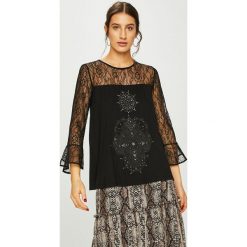 Desigual - Bluzka. Białe bluzki damskie Desigual, na co dzień, s, z nadrukiem, z elastanu, casualowe, z okrągłym kołnierzem, bez rękawów. W wyprzedaży za 159,90 zł.