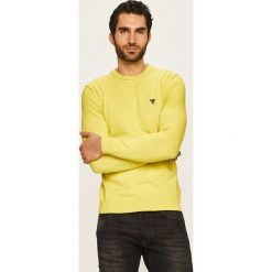 Guess Jeans - Sweter. Czarne swetry męskie Guess Jeans, s, z aplikacjami, z bawełny, z okrągłym kołnierzem, bez kaptura. W wyprzedaży za 199,90 zł.