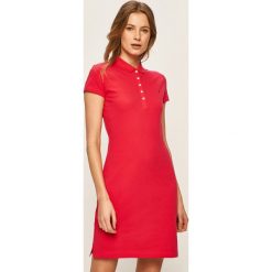 Tommy Hilfiger - Sukienka. Różowe sukienki damskie TOMMY HILFIGER, na co dzień, s, bez wzorów, z elastanu, casualowe, bez kołnierzyka, z krótkim rękawem, krótkie, mini, proste. Za 449,90 zł.