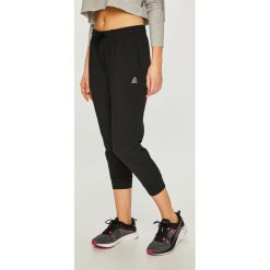 Reebok - Spodnie. Czarne spodnie sportowe damskie marki Reebok, s, z elastanu. Za 149,90 zł.