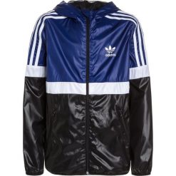 Adidas Originals TREFOIL Kurtka przejściowa mystery ink/white/black. Czarne kurtki męskie marki adidas Originals, z materiału. W wyprzedaży za 215,20 zł.
