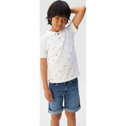 Mango Kids - Polo dziecięce Special5. Niebieskie t-shirty chłopięce Mango Kids, bez wzorów, z bawełny, z krótkim rękawem. W wyprzedaży za 29,90 zł.