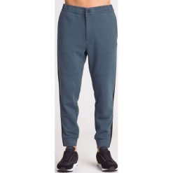 SPODNIE DRESOWE ARMANI EXCHANGE. Niebieskie spodnie męskie xxl, z dresówki. Za 249,50 zł.