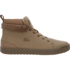 Skórzane sneakersy "Explorateurs" w kolorze jasnobrązowym. Pomarańczowe trampki i tenisówki damskie Lacoste. W wyprzedaży za 259,95 zł.