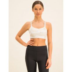 Biustonosz top Calvin Klein Performance 00GWH9K172. Białe topy damskie Calvin Klein Performance, m, bez wzorów, z elastanu, bez kołnierzyka. W wyprzedaży za 159,00 zł.