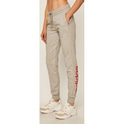 Adidas - Spodnie. Szare spodnie damskie Adidas, s, z bawełny. W wyprzedaży za 139,90 zł.