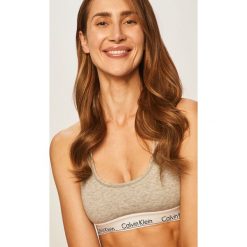 Calvin Klein Underwear - Biustonosz. Szare biustonosze sportowe damskie Calvin Klein Underwear, xs, z nadrukiem, z dzianiny. W wyprzedaży za 99,90 zł.