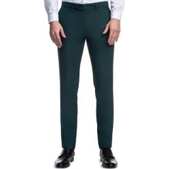 Spodnie LEONARDO GDZS900278. Żółte spodnie garniturowe męskie Giacomo Conti, bez wzorów, z wełny, eleganckie. Za 499,00 zł.