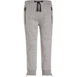 Kaporal NALAG Spodnie treningowe grey melanged. Szare jeansy chłopięce marki Kaporal. W wyprzedaży za 139,30 zł.