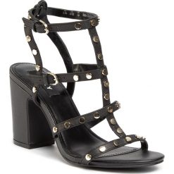 Sandały DKNY - Hanz K1011635 Black. Czarne klapki damskie DKNY, z aplikacjami, ze skóry ekologicznej, bez obcasa, na obcasie. W wyprzedaży za 389,00 zł.