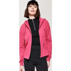 Bluzy damskie: Gładka bluza z kapturem - Różowy