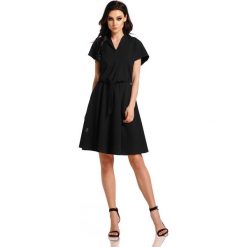 Sukienka dresowa elegancka rozkloszowana - czarny, m. Czarne sukienki damskie e-margeritka.pl, na co dzień, na lato, m, bez wzorów, z bawełny, eleganckie, bez kołnierzyka, z długim rękawem, długie, midi, rozkloszowane. Za 159,99 zł.
