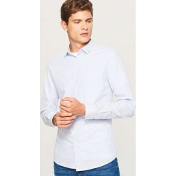 Koszula slim fit w paski - Niebieski. Niebieskie koszule męskie na spinki Reserved, l, w paski. W wyprzedaży za 49,99 zł.