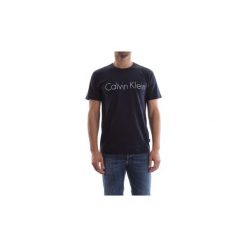 T-shirty z krótkim rękawem Calvin Klein Jeans K10K101973 JALO 7. Niebieskie t-shirty męskie Calvin Klein Jeans, xl, bez wzorów, z jeansu, bez kołnierzyka, krótkie. Za 184,00 zł.