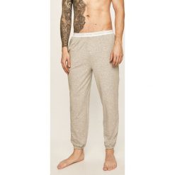Calvin Klein Underwear - Spodnie piżamowe CK One. Czarne piżamy męskie Calvin Klein Underwear, s, bez wzorów, z elastanu. Za 229,90 zł.