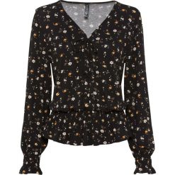 Bluzka shirtowa bonprix czarny w kwiaty. Czarne koszulki damskie bonprix, w kwiaty, bez kołnierzyka, bez rękawów. Za 89,99 zł.