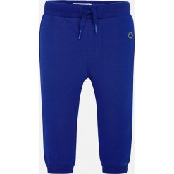 Mayoral - Spodnie dziecięce 68-98 cm. Niebieskie spodnie chłopięce marki Mayoral, z aplikacjami, z bawełny. Za 49,90 zł.